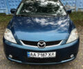 Синій Мазда 5, об'ємом двигуна 2 л та пробігом 229 тис. км за 4900 $, фото 1 на Automoto.ua