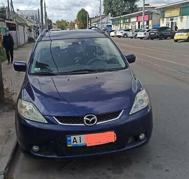Синий Мазда 5, объемом двигателя 2 л и пробегом 250 тыс. км за 5100 $, фото 1 на Automoto.ua