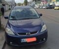 Синий Мазда 5, объемом двигателя 2 л и пробегом 250 тыс. км за 5100 $, фото 1 на Automoto.ua