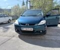 Синий Мазда 5, объемом двигателя 2 л и пробегом 282 тыс. км за 4700 $, фото 1 на Automoto.ua