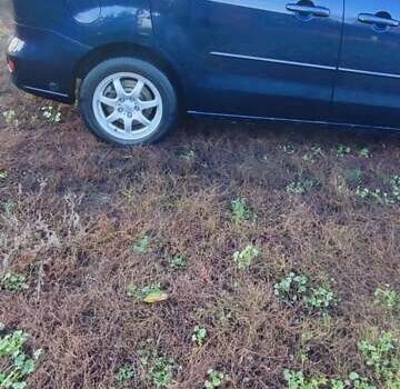 Синий Мазда 5, объемом двигателя 2 л и пробегом 322 тыс. км за 5700 $, фото 3 на Automoto.ua