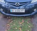 Синий Мазда 5, объемом двигателя 2 л и пробегом 322 тыс. км за 4300 $, фото 1 на Automoto.ua
