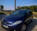 Синий Мазда 5, объемом двигателя 2 л и пробегом 255 тыс. км за 5800 $, фото 1 на Automoto.ua