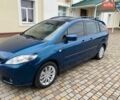 Синий Мазда 5, объемом двигателя 2 л и пробегом 200 тыс. км за 5500 $, фото 1 на Automoto.ua