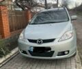 Синий Мазда 5, объемом двигателя 2 л и пробегом 200 тыс. км за 6200 $, фото 2 на Automoto.ua