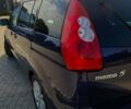 Синий Мазда 5, объемом двигателя 2 л и пробегом 285 тыс. км за 4014 $, фото 1 на Automoto.ua