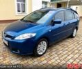 Синий Мазда 5, объемом двигателя 2 л и пробегом 200 тыс. км за 5500 $, фото 1 на Automoto.ua