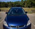 Синий Мазда 5, объемом двигателя 2 л и пробегом 285 тыс. км за 4014 $, фото 1 на Automoto.ua