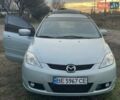 Синий Мазда 5, объемом двигателя 2 л и пробегом 200 тыс. км за 6200 $, фото 1 на Automoto.ua