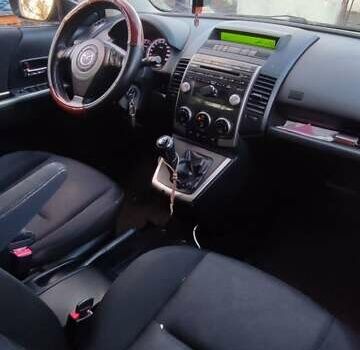 Синий Мазда 5, объемом двигателя 2 л и пробегом 322 тыс. км за 5700 $, фото 2 на Automoto.ua