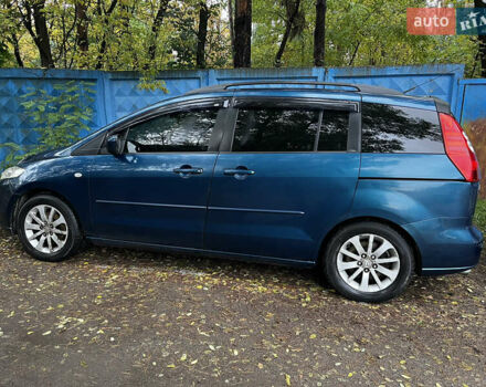 Синій Мазда 5, об'ємом двигуна 2 л та пробігом 229 тис. км за 4900 $, фото 1 на Automoto.ua