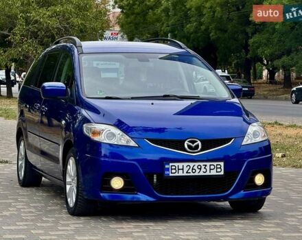 Синий Мазда 5, объемом двигателя 2 л и пробегом 285 тыс. км за 5999 $, фото 2 на Automoto.ua