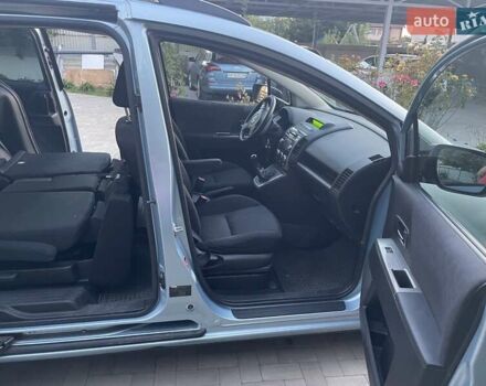 Синий Мазда 5, объемом двигателя 2 л и пробегом 243 тыс. км за 6000 $, фото 37 на Automoto.ua