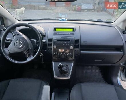 Синий Мазда 5, объемом двигателя 2 л и пробегом 243 тыс. км за 6000 $, фото 39 на Automoto.ua