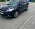 Синий Мазда 5, объемом двигателя 2 л и пробегом 185 тыс. км за 5800 $, фото 1 на Automoto.ua