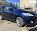 Синий Мазда 5, объемом двигателя 2 л и пробегом 255 тыс. км за 6600 $, фото 1 на Automoto.ua