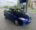 Синий Мазда 5, объемом двигателя 2 л и пробегом 283 тыс. км за 6999 $, фото 4 на Automoto.ua