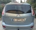 Синий Мазда 5, объемом двигателя 2 л и пробегом 243 тыс. км за 6000 $, фото 3 на Automoto.ua