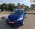 Синий Мазда 5, объемом двигателя 1.8 л и пробегом 242 тыс. км за 5600 $, фото 1 на Automoto.ua