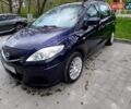 Синий Мазда 5, объемом двигателя 2 л и пробегом 257 тыс. км за 4750 $, фото 2 на Automoto.ua