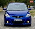 Синий Мазда 5, объемом двигателя 2 л и пробегом 285 тыс. км за 5999 $, фото 1 на Automoto.ua