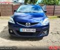 Синий Мазда 5, объемом двигателя 1.8 л и пробегом 211 тыс. км за 6500 $, фото 1 на Automoto.ua