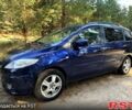 Синий Мазда 5, объемом двигателя 1.8 л и пробегом 217 тыс. км за 4950 $, фото 1 на Automoto.ua
