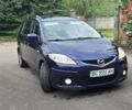 Синий Мазда 5, объемом двигателя 2 л и пробегом 244 тыс. км за 5600 $, фото 1 на Automoto.ua