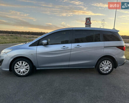 Синий Мазда 5, объемом двигателя 2 л и пробегом 140 тыс. км за 7999 $, фото 5 на Automoto.ua