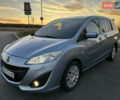 Синий Мазда 5, объемом двигателя 2 л и пробегом 140 тыс. км за 7999 $, фото 1 на Automoto.ua
