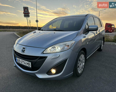 Синий Мазда 5, объемом двигателя 2 л и пробегом 140 тыс. км за 7999 $, фото 1 на Automoto.ua