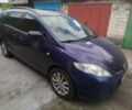 Синий Мазда 5, объемом двигателя 2 л и пробегом 300 тыс. км за 1472 $, фото 4 на Automoto.ua