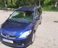 Синий Мазда 5, объемом двигателя 1.8 л и пробегом 330 тыс. км за 5100 $, фото 1 на Automoto.ua