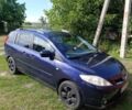 Синій Мазда 5, об'ємом двигуна 2 л та пробігом 227 тис. км за 6107 $, фото 1 на Automoto.ua