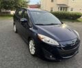 Синий Мазда 5, объемом двигателя 2.5 л и пробегом 105 тыс. км за 1205 $, фото 1 на Automoto.ua