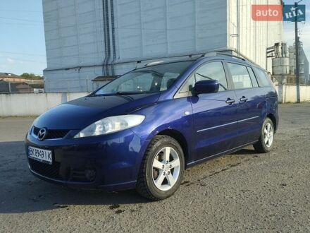 Синий Мазда 5, объемом двигателя 2 л и пробегом 262 тыс. км за 4300 $, фото 1 на Automoto.ua