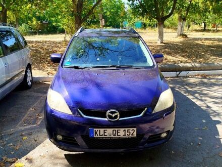 Синий Мазда 5, объемом двигателя 2 л и пробегом 227 тыс. км за 1800 $, фото 1 на Automoto.ua