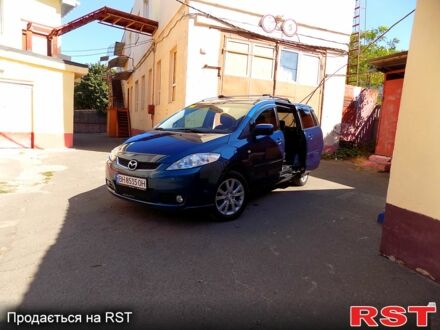 Синий Мазда 5, объемом двигателя 1.8 л и пробегом 260 тыс. км за 4900 $, фото 1 на Automoto.ua
