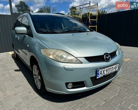 Синий Мазда 5, объемом двигателя 2 л и пробегом 250 тыс. км за 3800 $, фото 1 на Automoto.ua