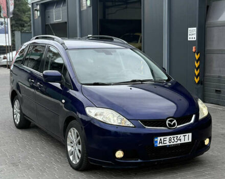 Синий Мазда 5, объемом двигателя 2 л и пробегом 214 тыс. км за 4750 $, фото 1 на Automoto.ua