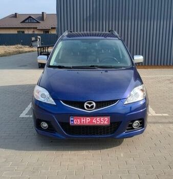 Синий Мазда 5, объемом двигателя 2 л и пробегом 238 тыс. км за 4400 $, фото 1 на Automoto.ua