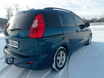 Синий Мазда 5, объемом двигателя 1.8 л и пробегом 236 тыс. км за 5000 $, фото 1 на Automoto.ua