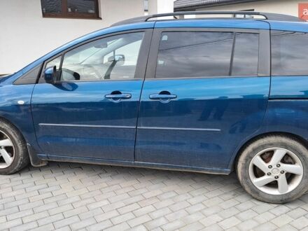 Синий Мазда 5, объемом двигателя 2 л и пробегом 302 тыс. км за 5000 $, фото 1 на Automoto.ua