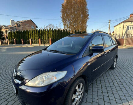 Синий Мазда 5, объемом двигателя 2 л и пробегом 220 тыс. км за 3600 $, фото 1 на Automoto.ua