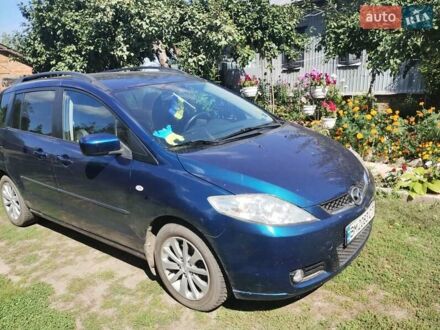 Синий Мазда 5, объемом двигателя 2 л и пробегом 170 тыс. км за 5500 $, фото 1 на Automoto.ua