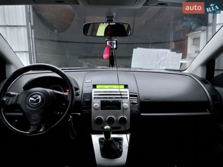 Синий Мазда 5, объемом двигателя 1.8 л и пробегом 255 тыс. км за 4500 $, фото 1 на Automoto.ua