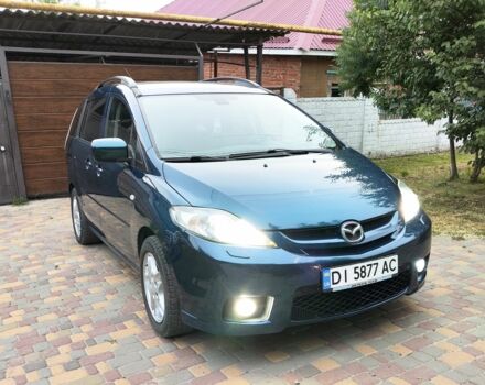 Синий Мазда 5, объемом двигателя 2 л и пробегом 246 тыс. км за 4633 $, фото 1 на Automoto.ua