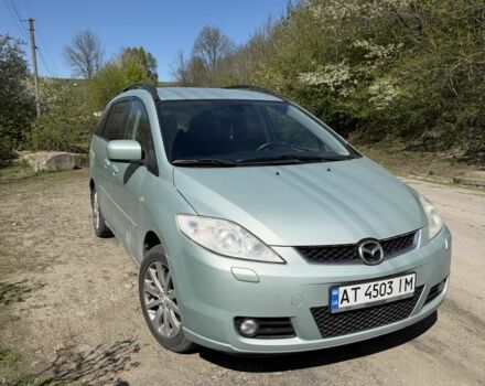 Синий Мазда 5, объемом двигателя 2 л и пробегом 200 тыс. км за 4599 $, фото 1 на Automoto.ua