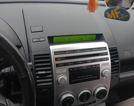 Синий Мазда 5, объемом двигателя 2 л и пробегом 200 тыс. км за 5500 $, фото 1 на Automoto.ua