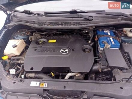 Синий Мазда 5, объемом двигателя 2 л и пробегом 250 тыс. км за 5500 $, фото 1 на Automoto.ua